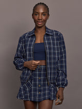 Model is wearing Check Jacquard Zip-Front Bomber Jacket in Navy, front view.