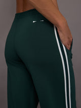 Green wide-leg track pants with white stripes 