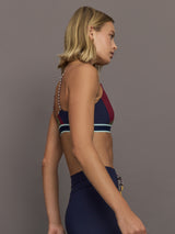 Model wearing a colorful sports bra