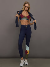 Model wearing a colorful sports bra