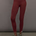 Model wears leggings in Terracotta with a waistband that sits just below the bellybutton and a length that ends slightly above the ankles.




