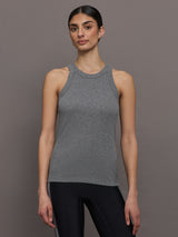 Model wears a heather gray high neck tank top. 
