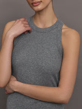 Model wears a heather gray high neck tank top. 