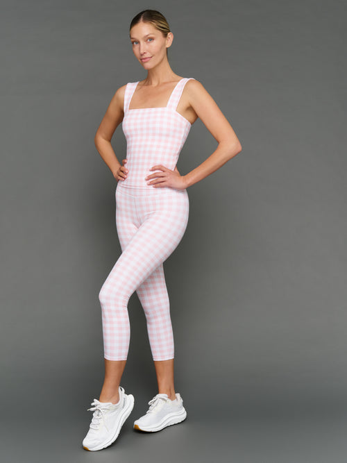 Model wears Gingham Capri Leggings and Tank on a grey background