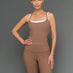 Model is wearing double layer melt tank caribou white, front upper body view.