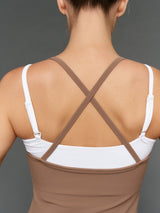 Model is wearing double layer melt tank caribou white, back strap close-up detail.