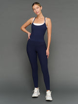 Model is wearing double layer melt tank navy blazer white, full body front view.