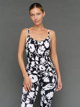 Model is wearing melt ruched tank floral print, front close-up.