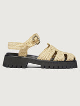 Slingback espadrille sandal with black sole. 