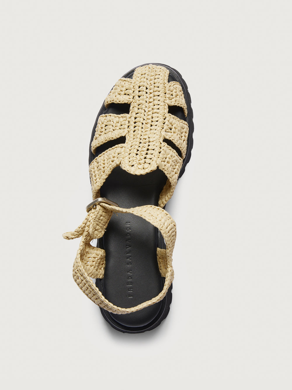 Slingback espadrille sandal with black sole. 