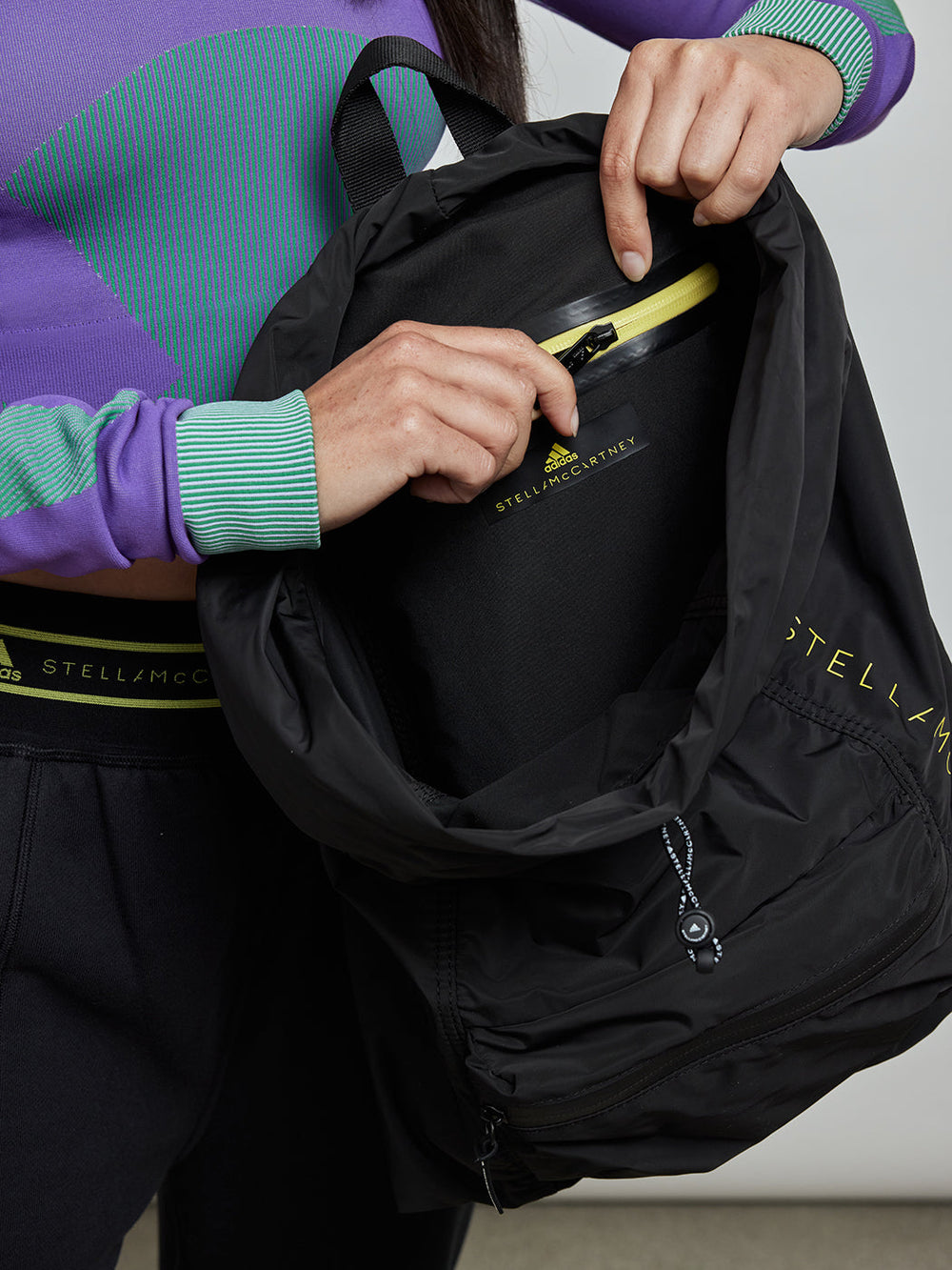 adidas by stella mccartney gym backpack Yoga Bag No need to pull everything out to get to what you need from the middle or down at the bottom the side zip gives you access to everything without opening up the top adidas by Stella McCartney 24/7