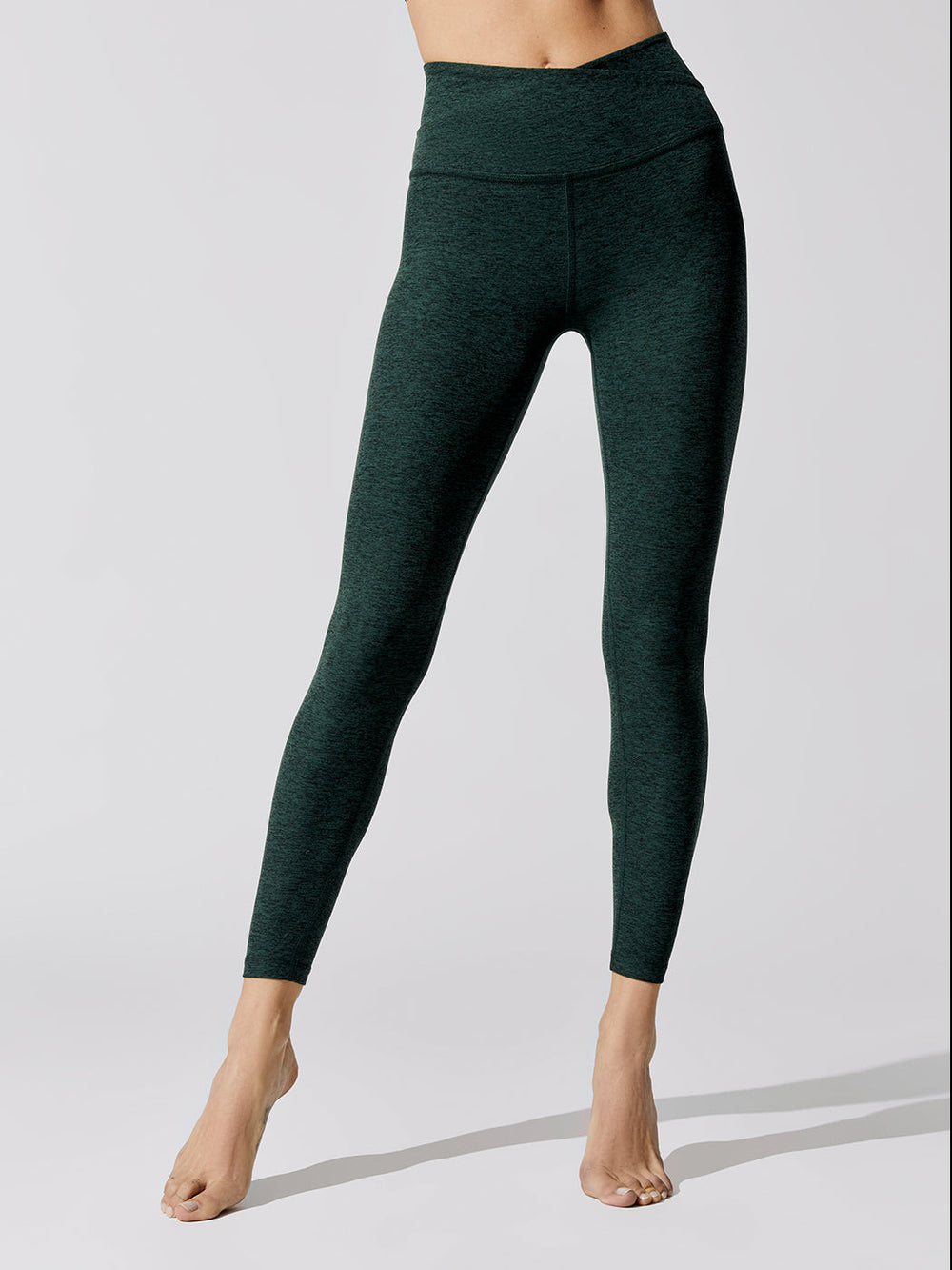 https://carbon38.com/cdn/shop/products/BEYO-SD3463-GRNDGR-At-Your-Leisure-High-Waisted-Midi-Legging-Color-FOREST-GREEN-PINE_0e3ba5c8-4636-4738-8fdc-05205dd61953.jpg?v=1661319833&width=1000