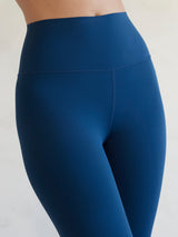 Close-up of waistband on French Navy Diamond Compression high-rise leggings.